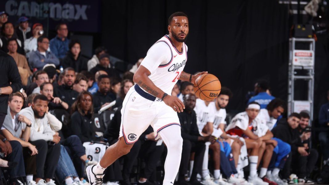 Sources: Powell to Heat, Collins to Clips in trade